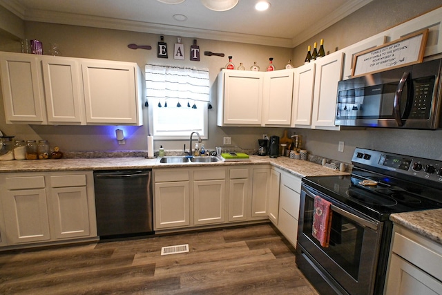 511 C St, Deepwater, MO 64740 - kitchen featuring range with electric stovetop, dishwashing machine, a sink, ornamental molding, and dark wood-style floors