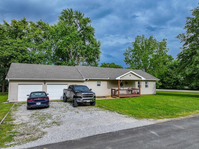 511 C St, Deepwater, MO 64740 - single story home with a front yard, an attached garage, driveway, a deck, and roof with shingles