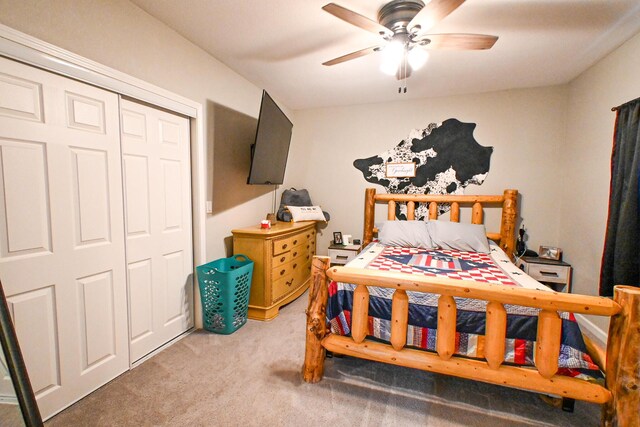 511 C St, Deepwater, MO 64740 - bedroom with light colored carpet, a ceiling fan, and a closet