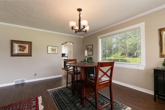1104 E Buffalo St, Bolivar, MO 65613 - dining space featuring arched walkways, dark wood-style floors, a chandelier, baseboards, and crown molding