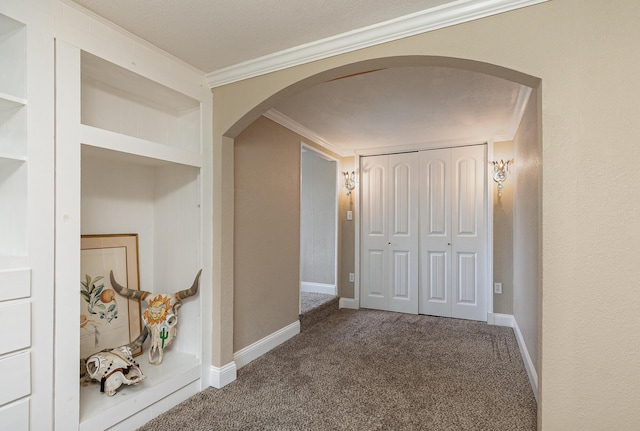 1104 E Buffalo St, Bolivar, MO 65613 - hallway with arched walkways, carpet floors, ornamental molding, and baseboards