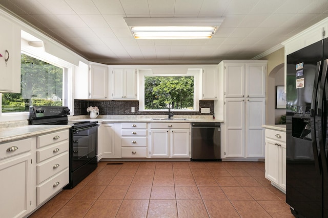 1104 E Buffalo St, Bolivar, MO 65613 - kitchen featuring black appliances, a sink, tasteful backsplash, white cabinets, and crown molding