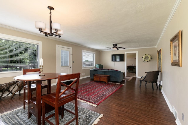 1104 E Buffalo St, Bolivar, MO 65613 - dining room with crown molding, a ceiling fan, dark wood-style floors, a textured ceiling, and a chandelier