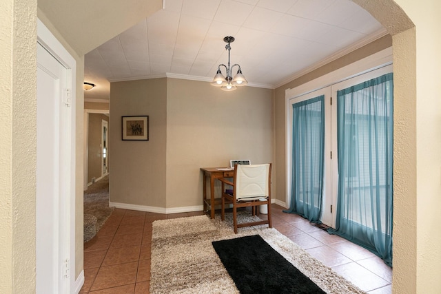 1104 E Buffalo St, Bolivar, MO 65613 - tiled dining room featuring ornamental molding, arched walkways, a chandelier, healthy amount of natural light, and baseboards