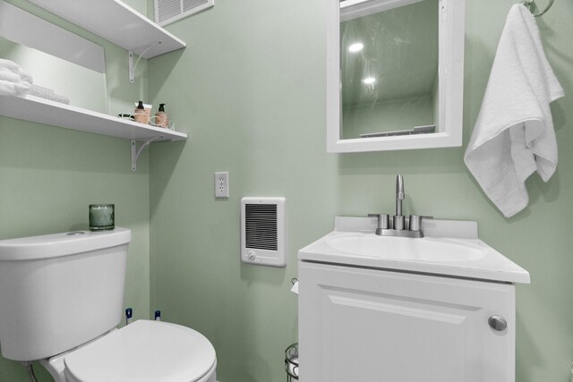 36205 State Highway 413, Crane, MO 65633 - half bath with toilet, vanity, and heating unit