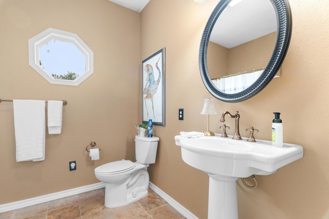 36205 State Highway 413, Crane, MO 65633 - bathroom featuring toilet, baseboards, and tile patterned floors