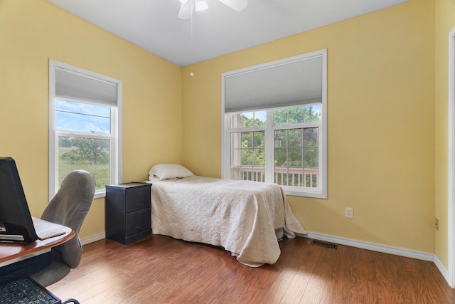 36205 State Highway 413, Crane, MO 65633 - bedroom featuring baseboards, wood finished floors, and an office area