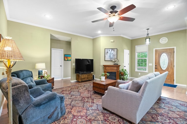 36205 State Highway 413, Crane, MO 65633 - living area featuring a ceiling fan, baseboards, recessed lighting, crown molding, and wood finished floors