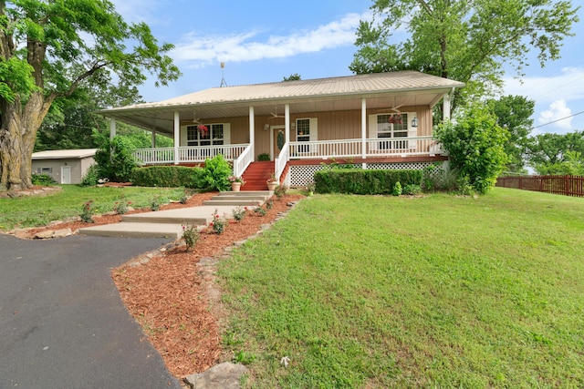 36205 State Highway 413, Crane, MO 65633 - view of front of home featuring a porch and metal roof