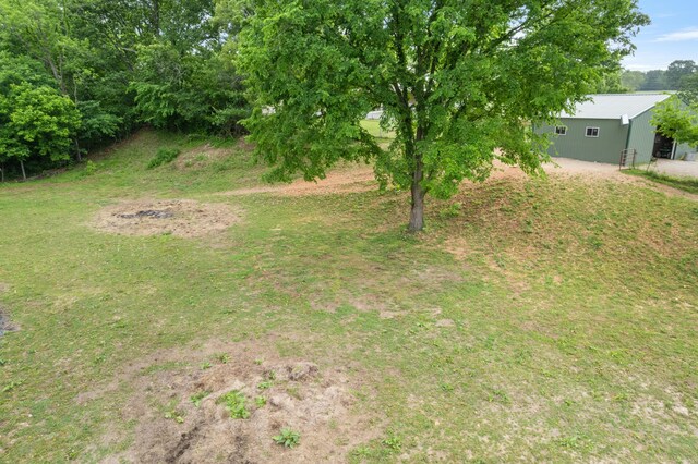 36205 State Highway 413, Crane, MO 65633 - view of grassy yard featuring an outdoor structure and a pole building