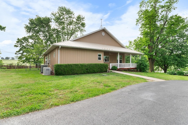 36205 State Highway 413, Crane, MO 65633 - view of front of home with covered porch and central AC
