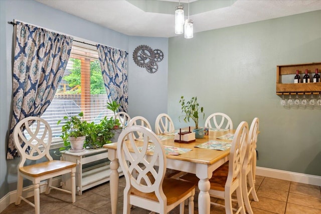 1270 E Ogorman Ct, Springfield, MO 65803 - tiled dining space featuring baseboards