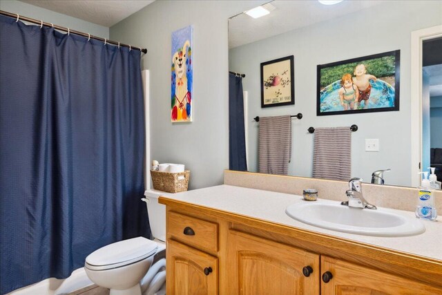 1270 E Ogorman Ct, Springfield, MO 65803 - bathroom with toilet and vanity