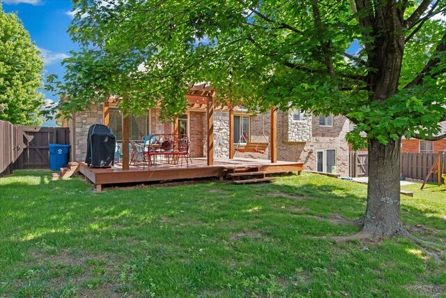 1270 E Ogorman Ct, Springfield, MO 65803 - rear view of house with a wooden deck, brick siding, and stone siding