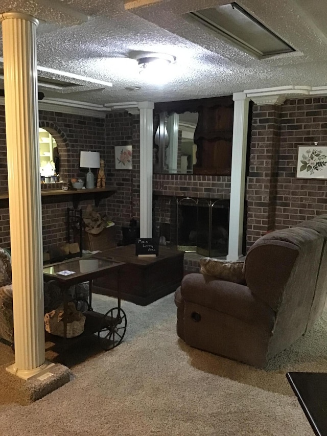 310 S 6th St, Thayer, MO 65791 - finished below grade area with a fireplace, carpet flooring, brick wall, and a textured ceiling