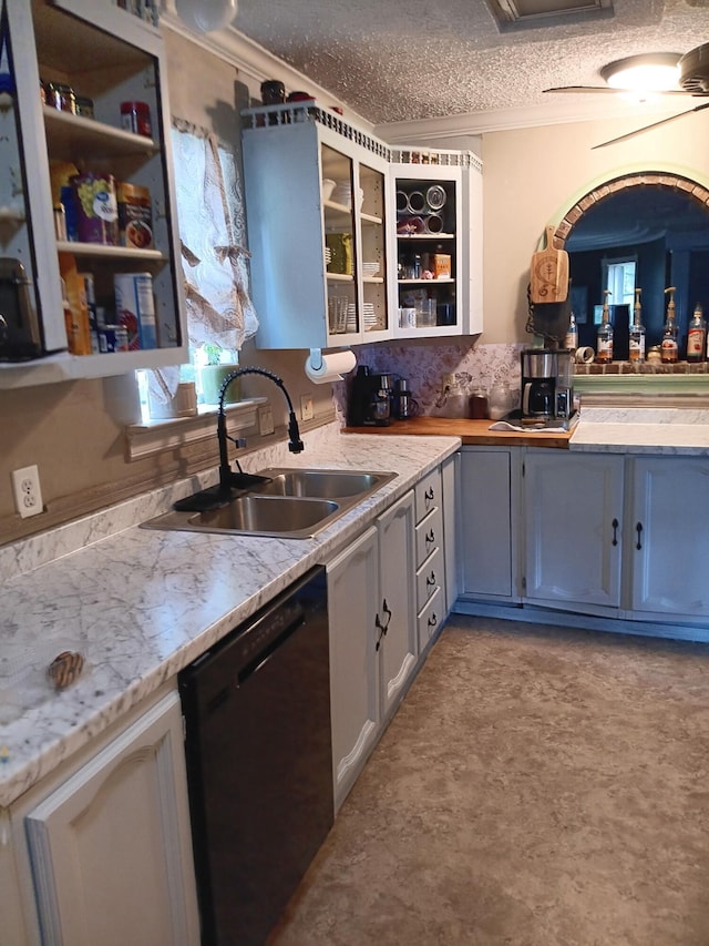 310 S 6th St, Thayer, MO 65791 - kitchen with dishwasher, open shelves, crown molding, glass insert cabinets, and a textured ceiling