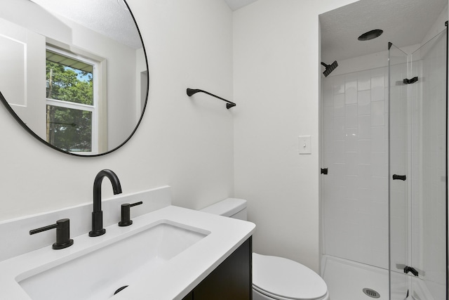 2658 S Hillsboro, Springfield, MO 65802 - full bathroom featuring toilet, a shower stall, vanity, and a textured ceiling