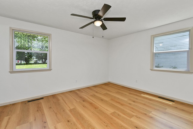 2658 S Hillsboro, Springfield, MO 65802 - empty room with baseboards, wood finished floors, and a ceiling fan