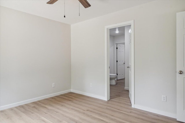 1052 S Overhill Ave, Springfield, MO 65802 - empty room featuring ceiling fan, light wood-style flooring, and baseboards