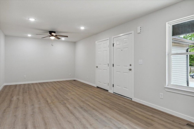 1052 S Overhill Ave, Springfield, MO 65802 - foyer entrance featuring ceiling fan, light wood-style flooring, baseboards, and recessed lighting