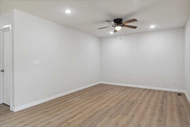 1052 S Overhill Ave, Springfield, MO 65802 - spare room with light wood-style floors, recessed lighting, ceiling fan, and baseboards