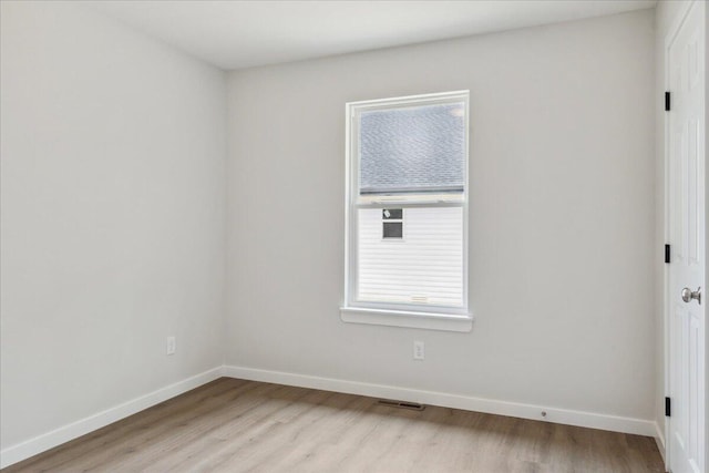 1052 S Overhill Ave, Springfield, MO 65802 - unfurnished room with light wood-type flooring and baseboards
