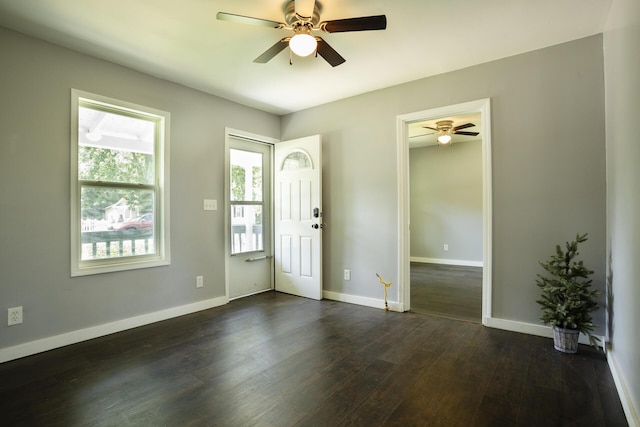 1443 6th St, West Plains, MO 65775 - entrance foyer featuring ceiling fan, dark wood-style flooring, and baseboards