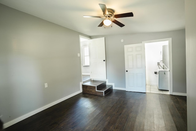 1443 6th St, West Plains, MO 65775 - unfurnished bedroom featuring baseboards, wood finished floors, washer / dryer, and ceiling fan