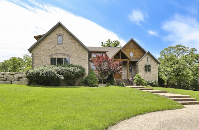 184 Appaloosa Trl, Saddlebrooke, MO 65630 - view of front of house with a front lawn and stone siding