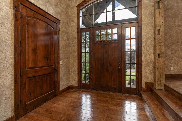 184 Appaloosa Trl, Saddlebrooke, MO 65630 - entrance foyer featuring hardwood / wood-style flooring, baseboards, and a textured wall