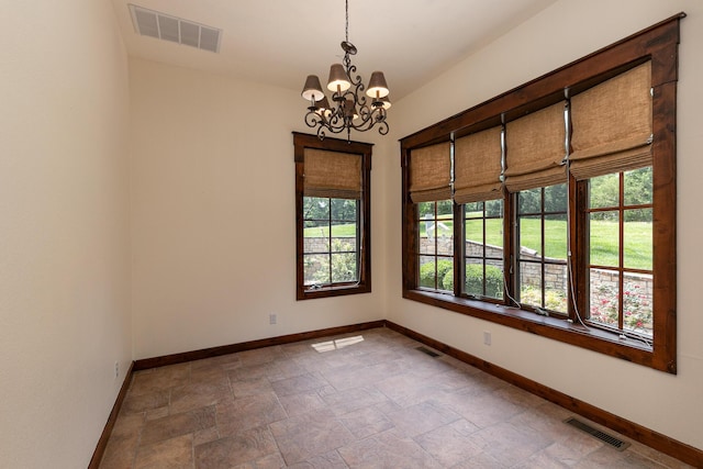 184 Appaloosa Trl, Saddlebrooke, MO 65630 - empty room featuring baseboards, a chandelier, and stone finish flooring