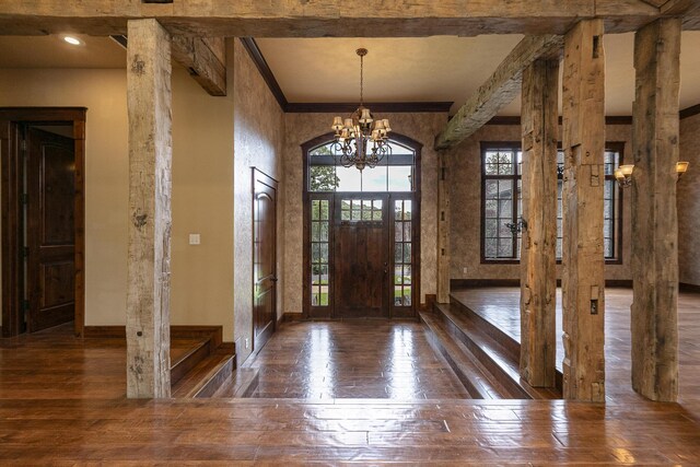 184 Appaloosa Trl, Saddlebrooke, MO 65630 - entrance foyer with a chandelier, hardwood / wood-style floors, baseboards, and ornamental molding