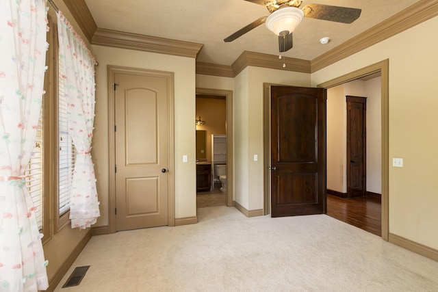 184 Appaloosa Trl, Saddlebrooke, MO 65630 - unfurnished bedroom featuring carpet, ornamental molding, baseboards, and ceiling fan