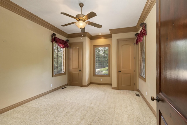 184 Appaloosa Trl, Saddlebrooke, MO 65630 - spare room with light colored carpet, baseboards, crown molding, and a ceiling fan