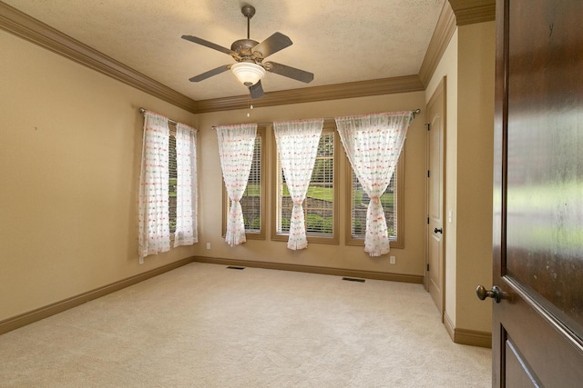 184 Appaloosa Trl, Saddlebrooke, MO 65630 - empty room featuring crown molding, light colored carpet, a textured ceiling, a ceiling fan, and baseboards