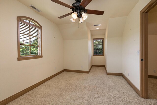 184 Appaloosa Trl, Saddlebrooke, MO 65630 - additional living space with light colored carpet, baseboards, a ceiling fan, and lofted ceiling