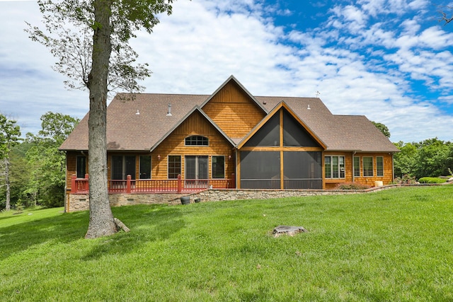 184 Appaloosa Trl, Saddlebrooke, MO 65630 - rear view of house with a sunroom, a yard, and a shingled roof