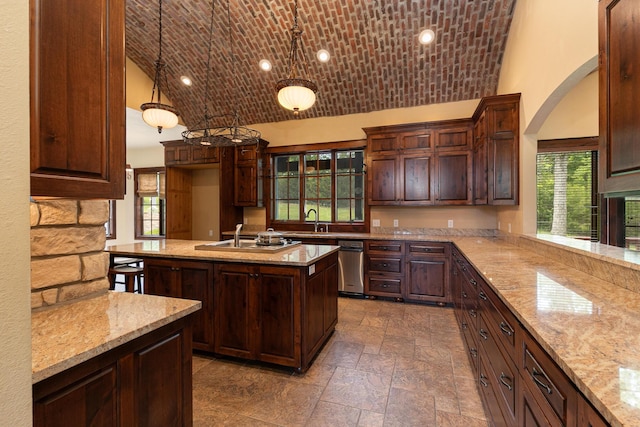184 Appaloosa Trl, Saddlebrooke, MO 65630 - kitchen with lofted ceiling, a sink, brick ceiling, stone tile flooring, and light stone countertops