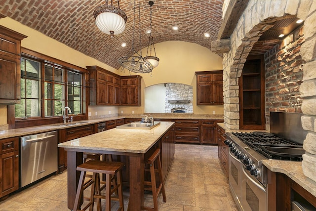 184 Appaloosa Trl, Saddlebrooke, MO 65630 - kitchen featuring appliances with stainless steel finishes, a sink, stone tile flooring, arched walkways, and recessed lighting