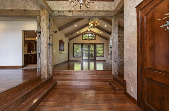 184 Appaloosa Trl, Saddlebrooke, MO 65630 - foyer entrance with a chandelier, hardwood / wood-style flooring, arched walkways, and baseboards
