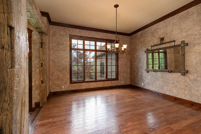 184 Appaloosa Trl, Saddlebrooke, MO 65630 - unfurnished dining area with hardwood / wood-style flooring, crown molding, a chandelier, and baseboards