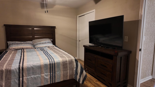 606 W Clover Dr, Clinton, MO 64735 - bedroom with wood finished floors
