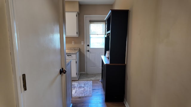 606 W Clover Dr, Clinton, MO 64735 - hallway featuring wood-type flooring and baseboards