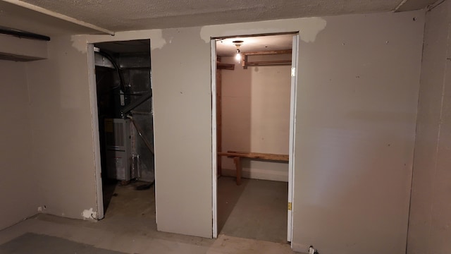 606 W Clover Dr, Clinton, MO 64735 - unfurnished bedroom with concrete flooring and a closet