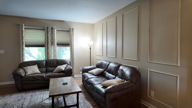 606 W Clover Dr, Clinton, MO 64735 - living area featuring wood finished floors and baseboards