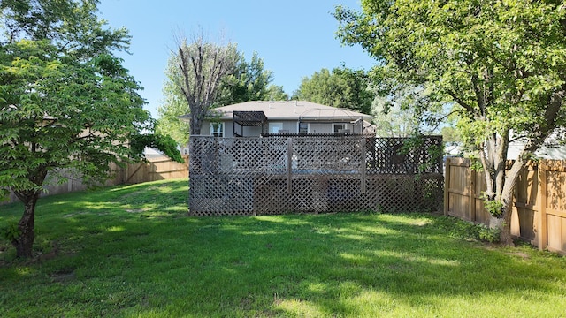 606 W Clover Dr, Clinton, MO 64735 - rear view of property with a deck