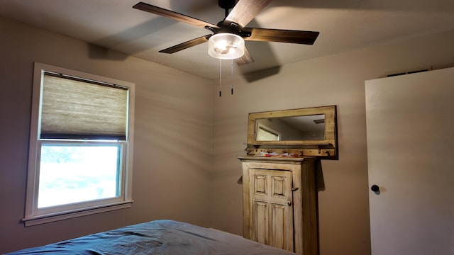 606 W Clover Dr, Clinton, MO 64735 - bedroom featuring ceiling fan