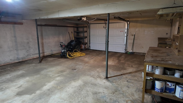 606 W Clover Dr, Clinton, MO 64735 - garage featuring a garage door opener
