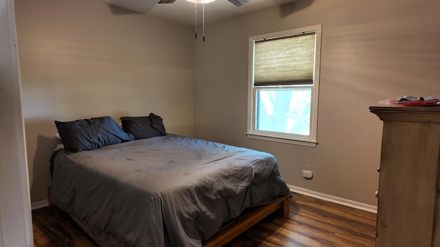 606 W Clover Dr, Clinton, MO 64735 - bedroom featuring wood finished floors, baseboards, and a ceiling fan
