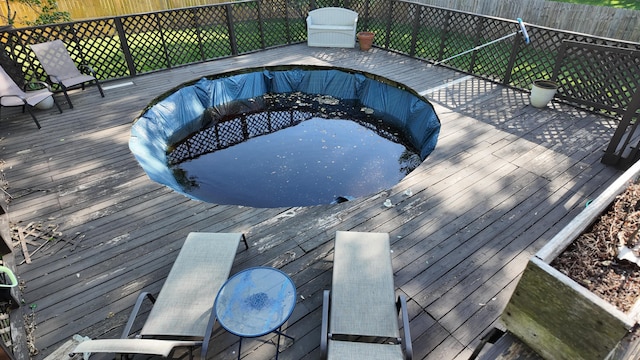 606 W Clover Dr, Clinton, MO 64735 - view of swimming pool featuring a fenced backyard and a deck